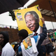 South Africans outside Soccer City Stadium in Johannesburg after attending the memorial service for former South African President Nelson Mandela, Dec. 10, 2013
MARCO LONGARI/AFP/Getty Images